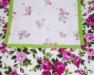 Cerise-patchwork-cot-quilt-centre-detail