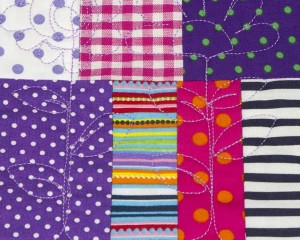 Coolest-Cats-in-Town-patchwork-cot-quilt-stitching-detail-Q000115