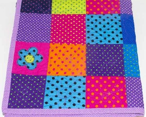 Dotty-About-You-patchwork-cot-quilt-folded-Q000117