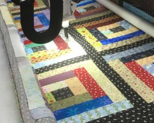 Customer quilt being quilted