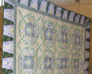 Quilt-hanging-at-exhibition