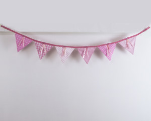 Ribbons and sequins bunting in pink