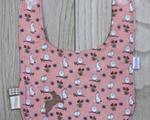 BB010 Peach Rabbits and Owls traditional bib front